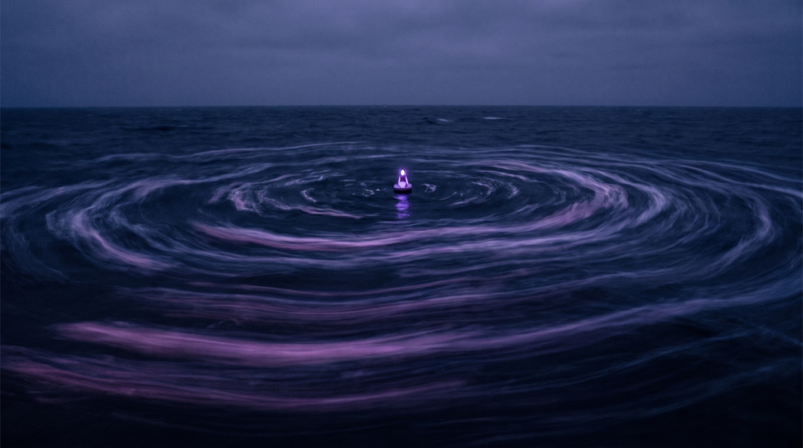 Concentric waves of violet light radiating across dark water, representing personalized campaigns reaching every channel